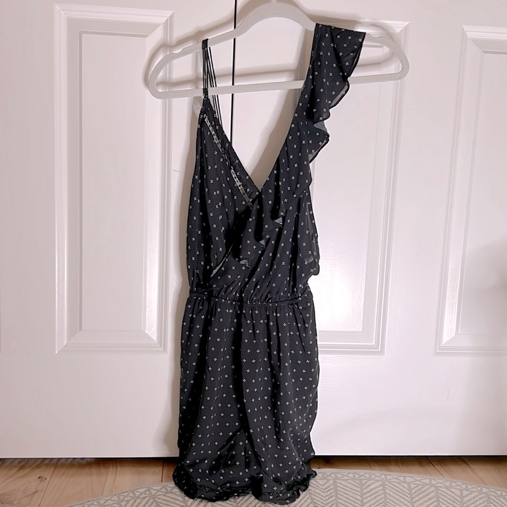 Adorable ruffle sleeve Free People romper